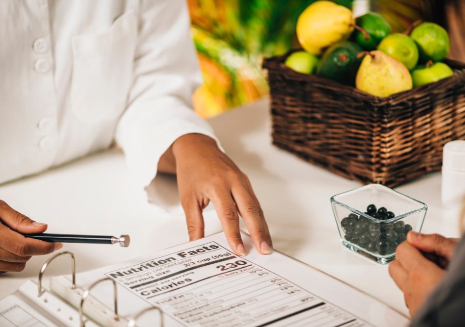 woman explaining a nutrition label