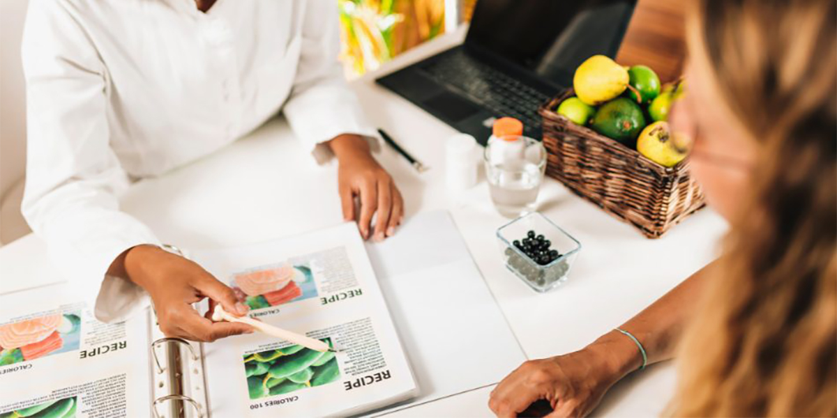 Nutritionist showing a label